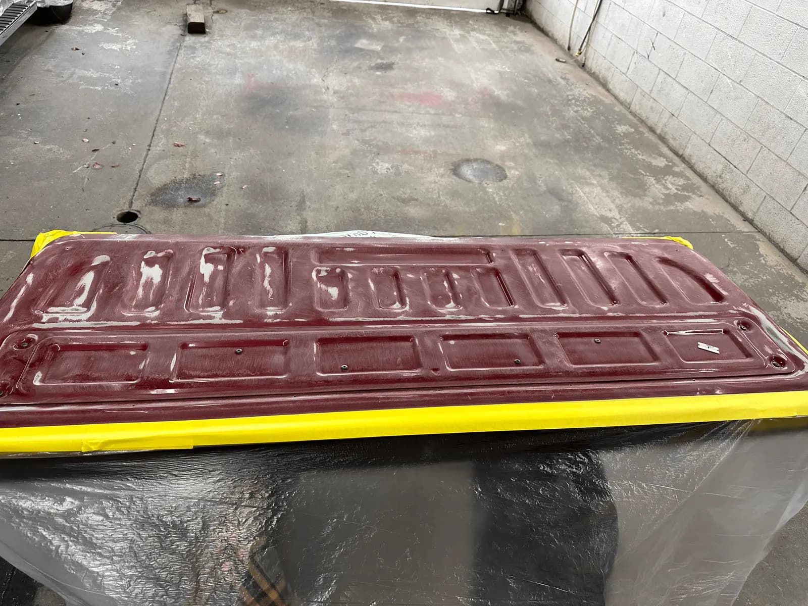 Truck bed prepped for a Raptor spray-in liner