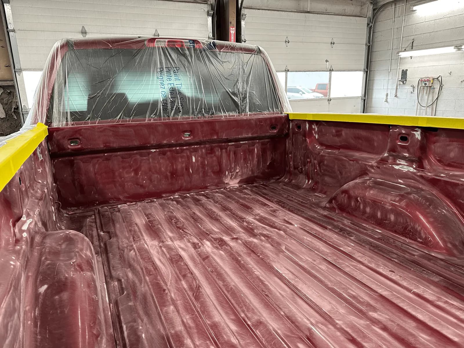 Truck bed with a freshly sprayed Raptor liner