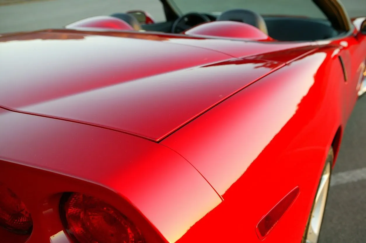 Close-up of a glossy ceramic coated paint finish at Triple C Car Care Center