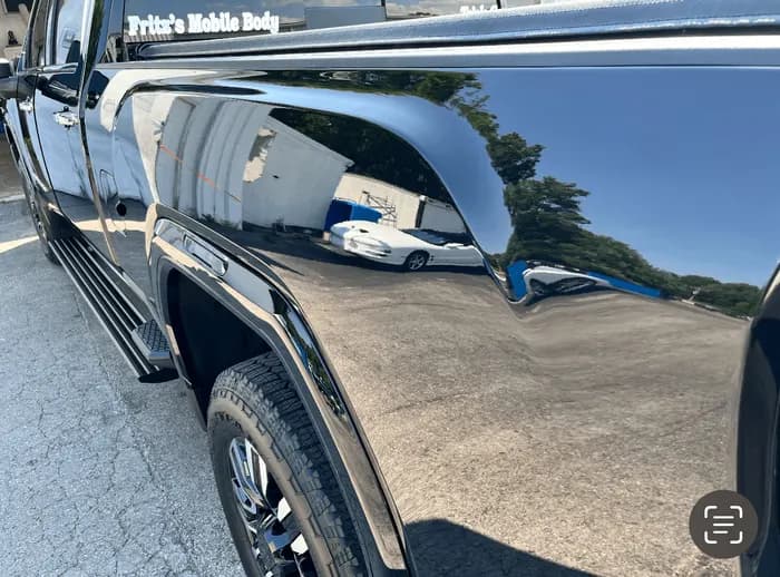 Black pickup truck with a mirror-gloss ceramic coated finish